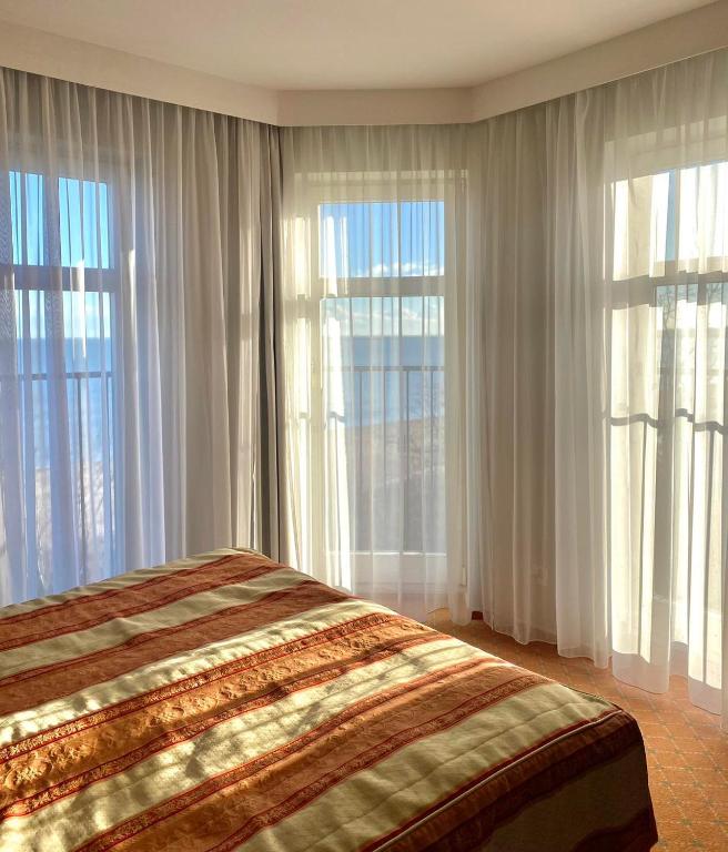Posteľ alebo postele v izbe v ubytovaní Hotel Lival