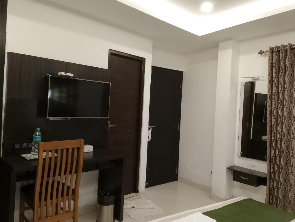 TV a/nebo společenská místnost v ubytování Hotel Greenlife