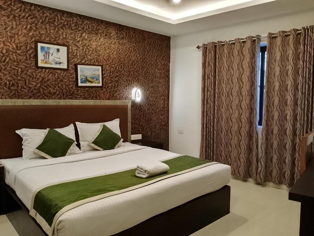 Postel nebo postele na pokoji v ubytování Hotel Greenlife