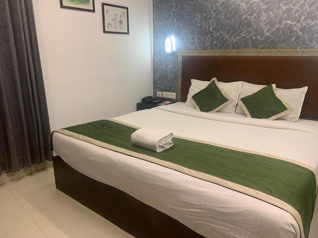 Postel nebo postele na pokoji v ubytování Hotel Greenlife
