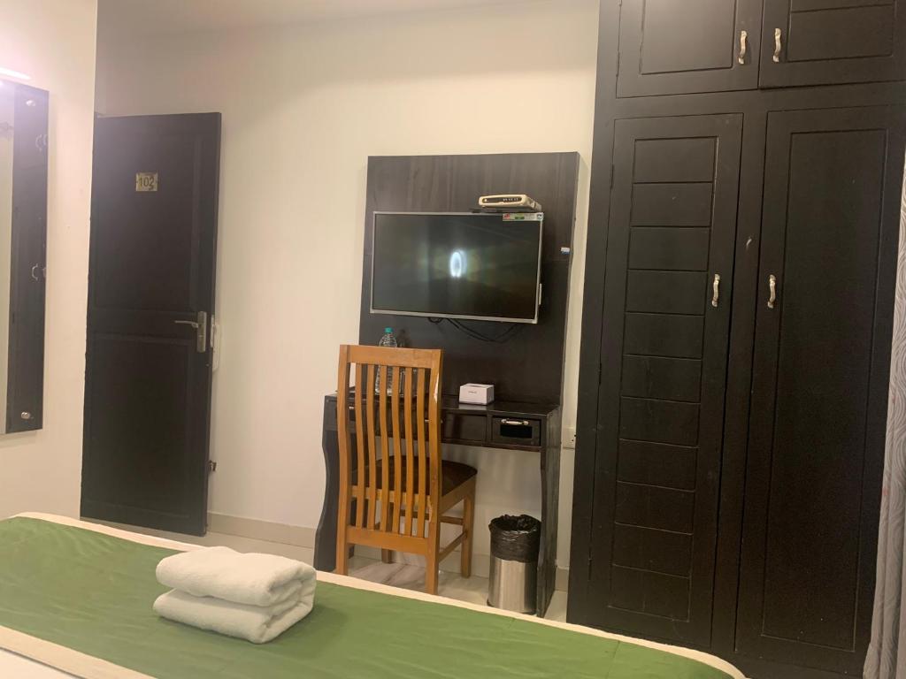 TV a/nebo společenská místnost v ubytování Hotel Greenlife