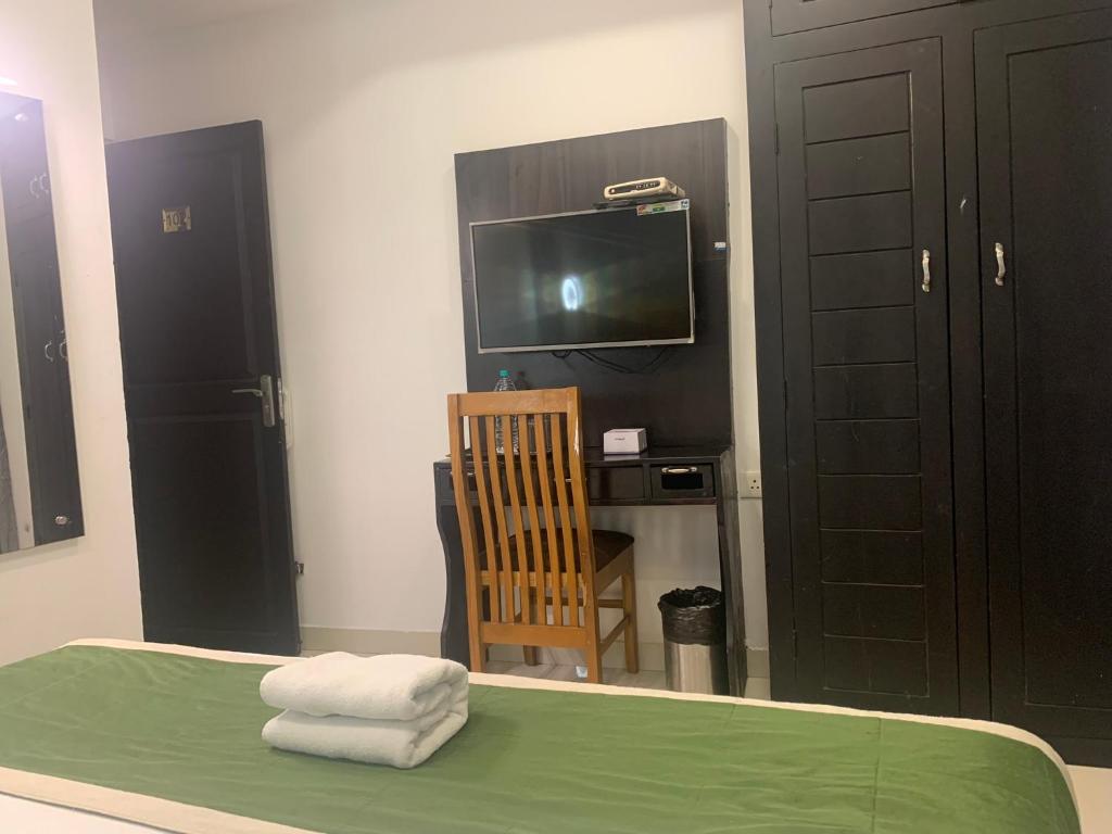 TV a/nebo společenská místnost v ubytování Hotel Greenlife