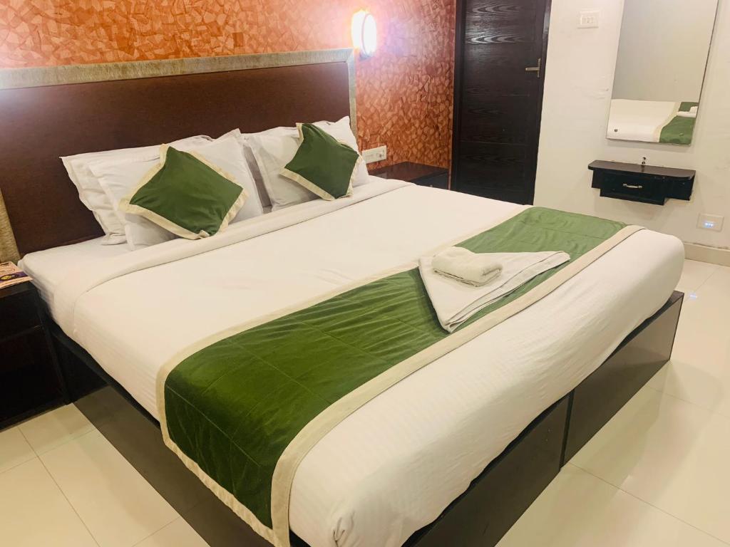Postel nebo postele na pokoji v ubytování Hotel Greenlife