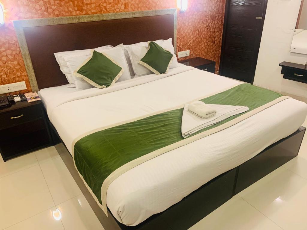 Postel nebo postele na pokoji v ubytování Hotel Greenlife