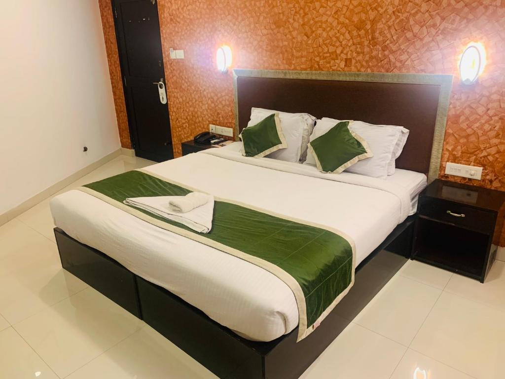 Postel nebo postele na pokoji v ubytování Hotel Greenlife