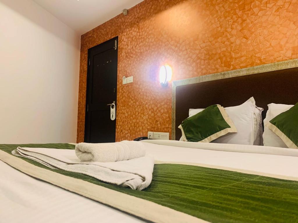 Postel nebo postele na pokoji v ubytování Hotel Greenlife