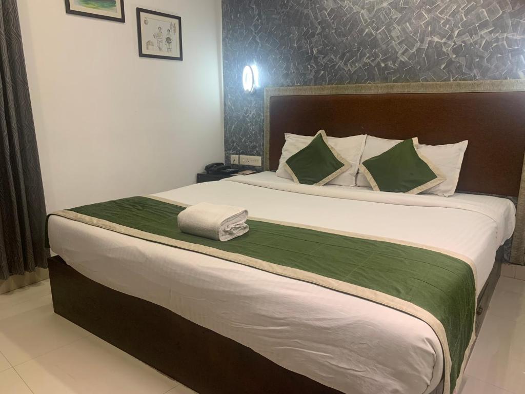 Postel nebo postele na pokoji v ubytování Hotel Greenlife