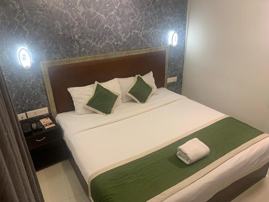 Postel nebo postele na pokoji v ubytování Hotel Greenlife