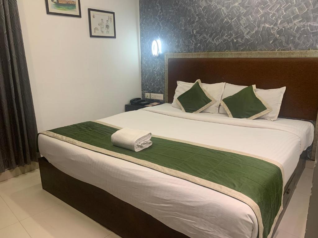 Postel nebo postele na pokoji v ubytování Hotel Greenlife
