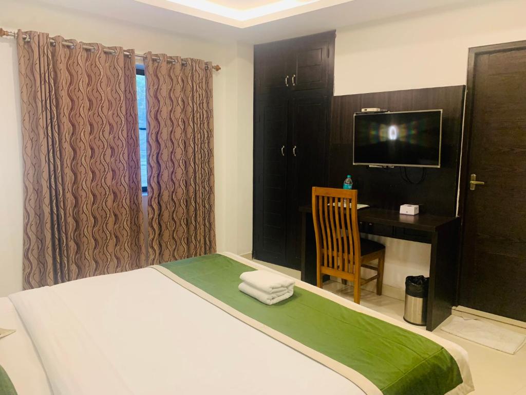 Postel nebo postele na pokoji v ubytování Hotel Greenlife