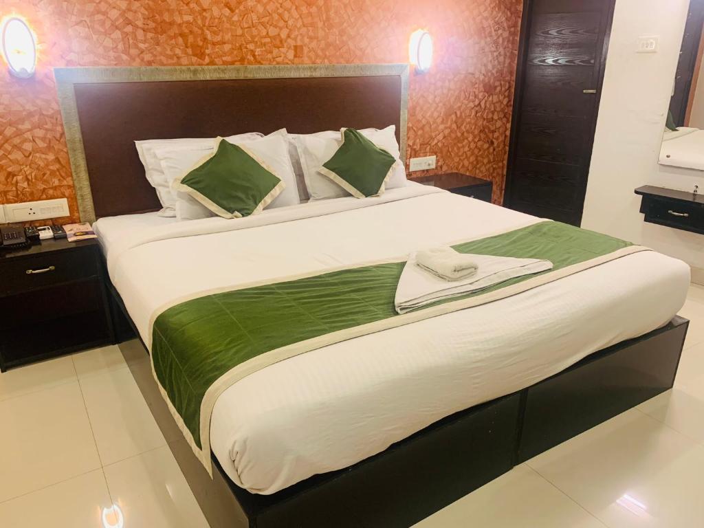 Postel nebo postele na pokoji v ubytování Hotel Greenlife
