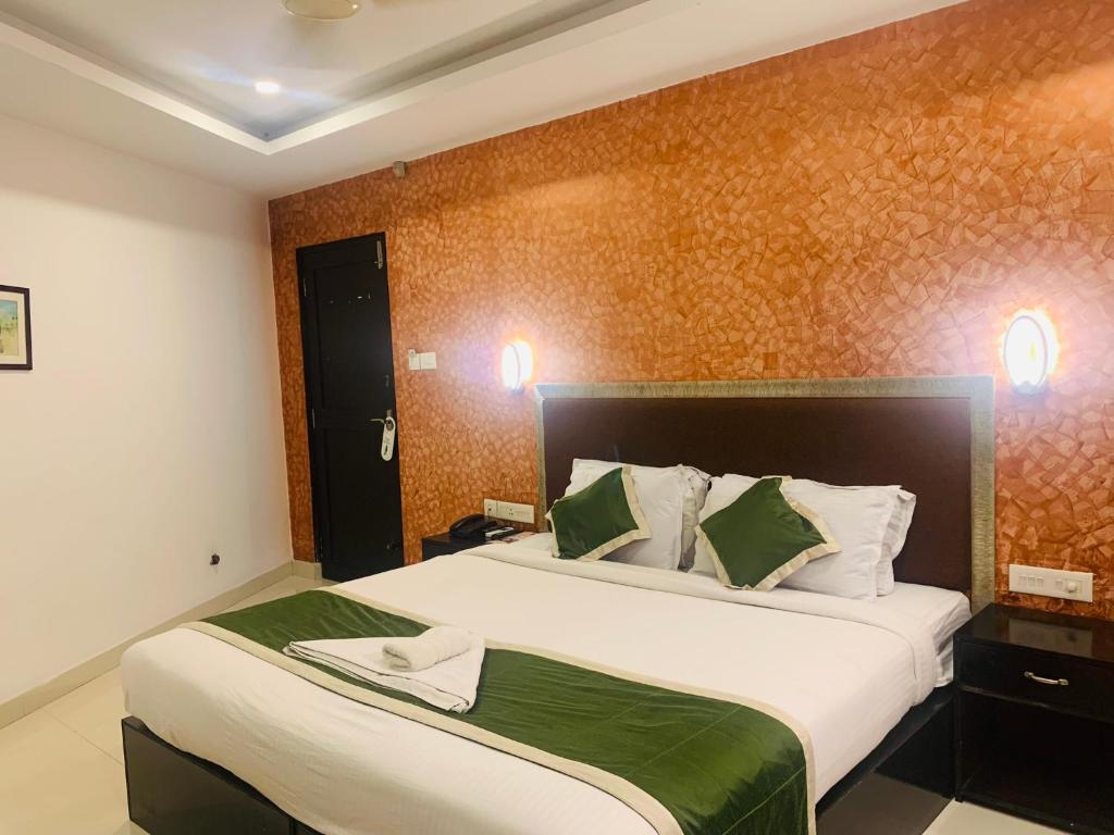 Postel nebo postele na pokoji v ubytování Hotel Greenlife