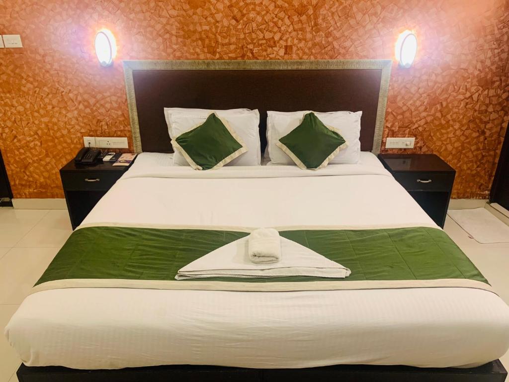 Postel nebo postele na pokoji v ubytování Hotel Greenlife