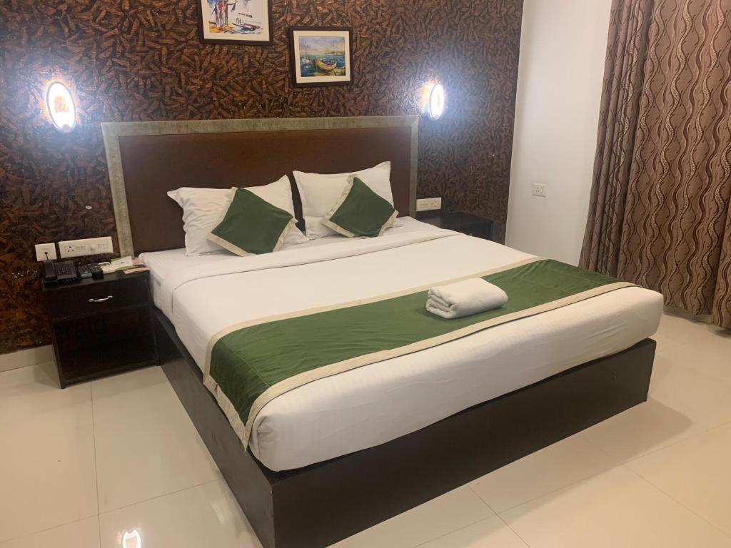Postel nebo postele na pokoji v ubytování Hotel Greenlife
