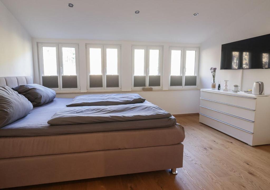 Postel nebo postele na pokoji v ubytování Residenz Kirchberg