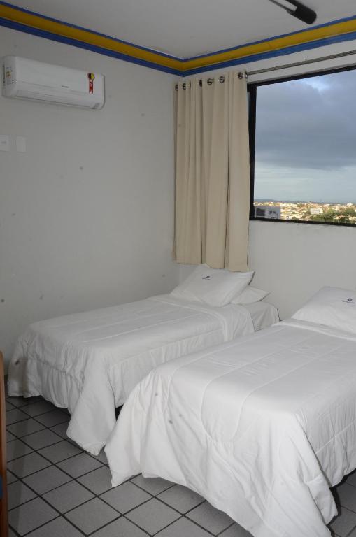  Titão Plaza Hotel
