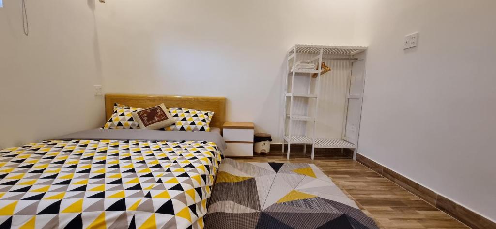 Postel nebo postele na pokoji v ubytování Gió Rừng GuestHouse Đà Lạt