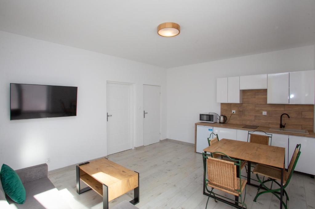 Kuchyň nebo kuchyňský kout v ubytování Stilo Hotel