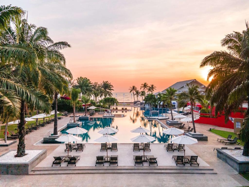 a view of the pool at the resort at Radisson Resort & Spa Hua Hin in Cha Am