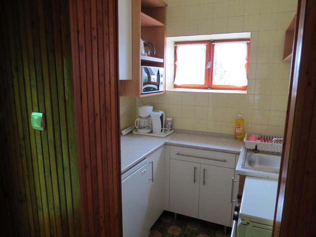 Kuchnia lub aneks kuchenny w obiekcie Titi Boutique Apartmanok
