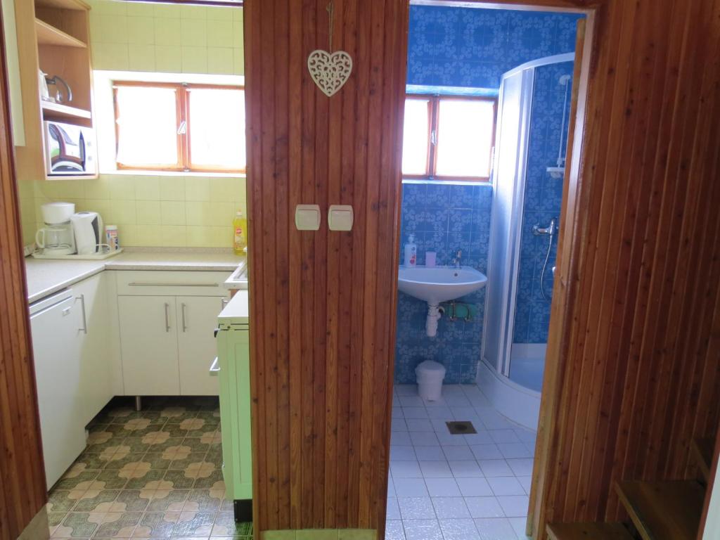 Łazienka w obiekcie Titi Boutique Apartmanok
