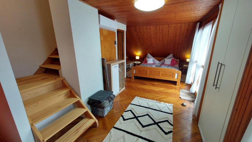 Łóżko lub łóżka w pokoju w obiekcie Titi Boutique Apartmanok