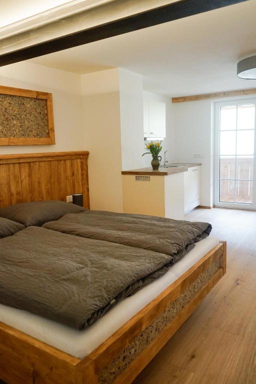 Postel nebo postele na pokoji v ubytování Haus am Wald