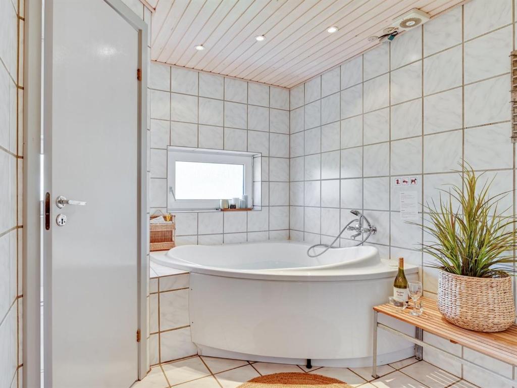 Koupelna v ubytování Holiday Home Faina - 100m from the sea by Interhome