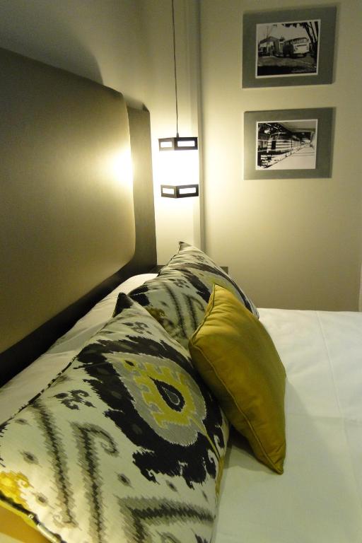 Ambit Boulevard Hotel Boutiqueにあるベッド