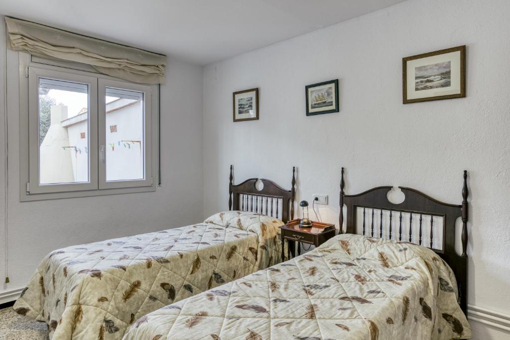 Posteľ alebo postele v izbe v ubytovaní Casa Dalies