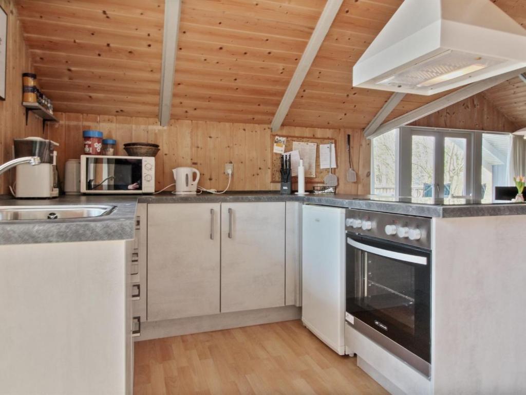 Kuchyň nebo kuchyňský kout v ubytování Holiday Home Carlotta - 12km from the sea by Interhome