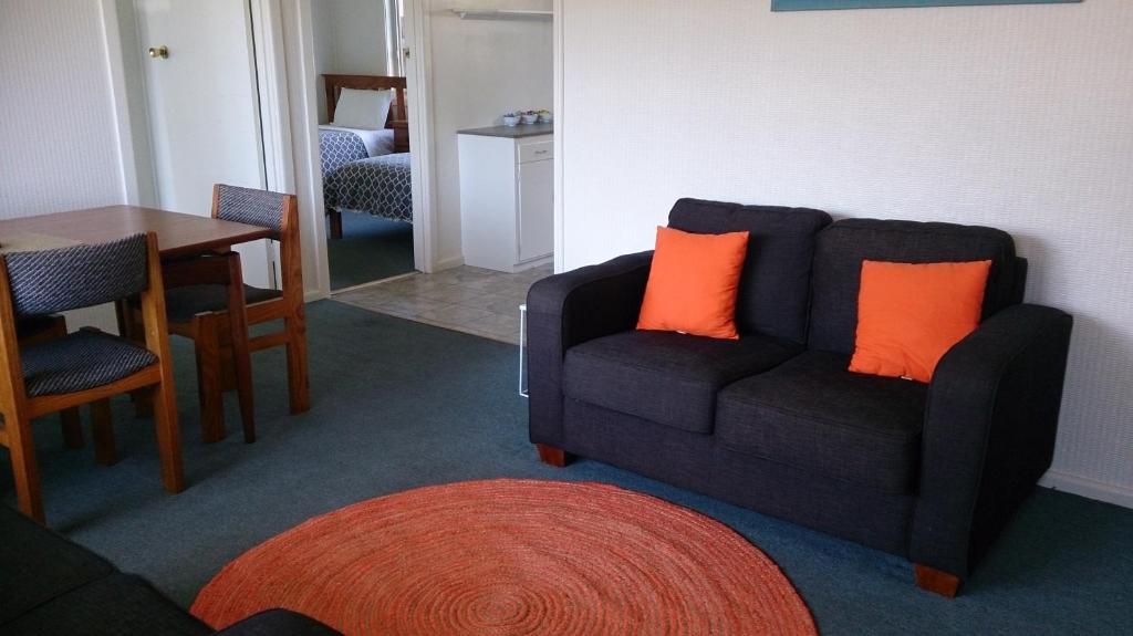 Area soggiorno di Phillip Island Cottages
