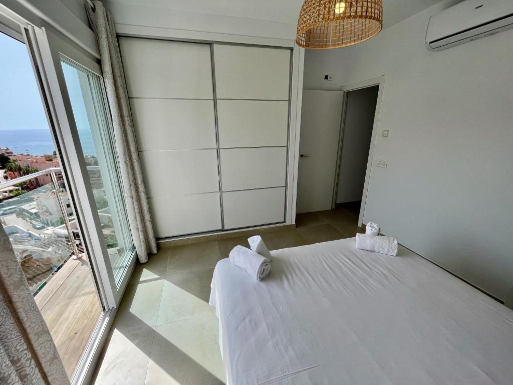 Posteľ alebo postele v izbe v ubytovaní Nerja Paradise Rentals - Villa Encanto