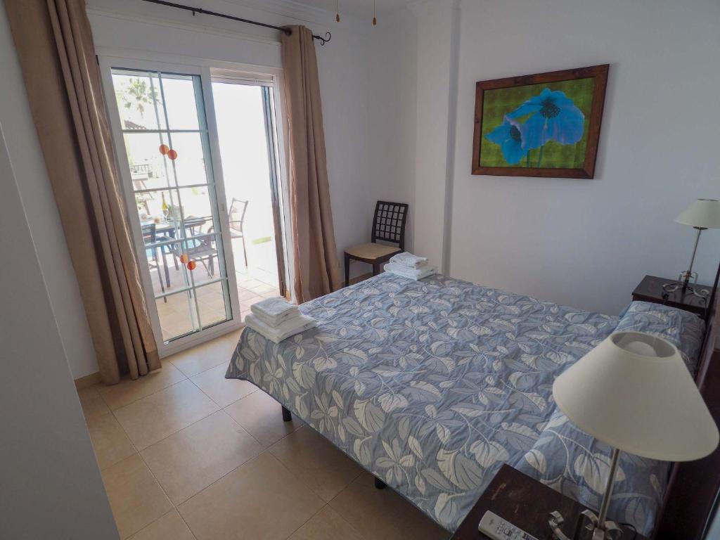 Posteľ alebo postele v izbe v ubytovaní Nerja Paradise Rentals - Villa Las Brisas