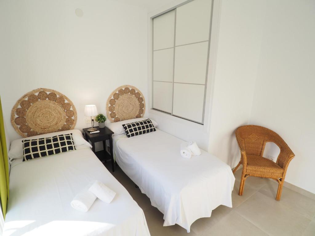 Posteľ alebo postele v izbe v ubytovaní Nerja Paradise Rentals - Villa Encanto