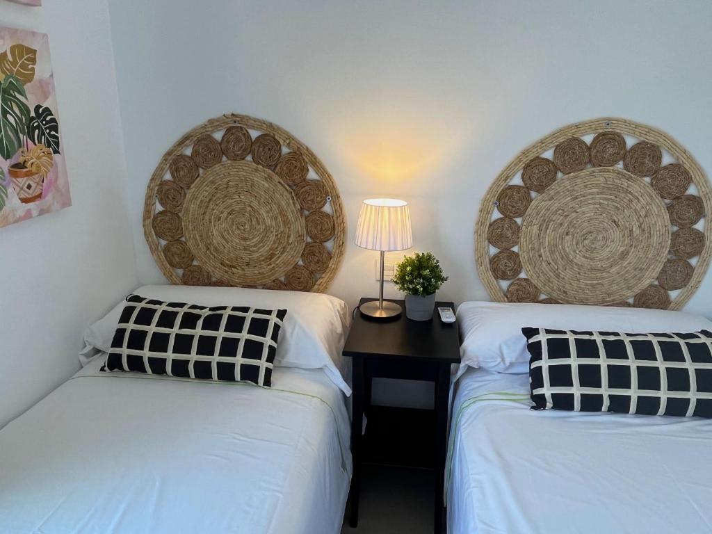 Posteľ alebo postele v izbe v ubytovaní Nerja Paradise Rentals - Villa Encanto