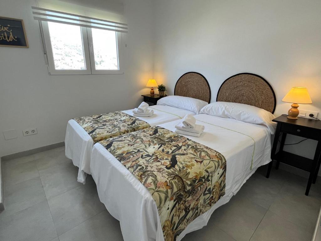 Postel nebo postele na pokoji v ubytování Nerja Paradise Rentals - Morasol Apartment 5