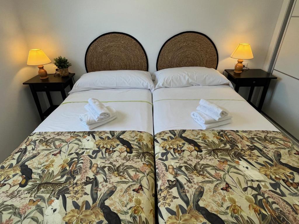 Postel nebo postele na pokoji v ubytování Nerja Paradise Rentals - Morasol Apartment 5