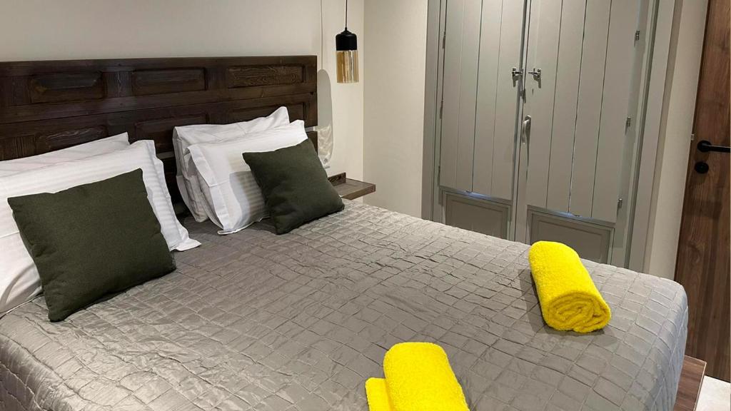 Postel nebo postele na pokoji v ubytování Amalthea Luxury Suites