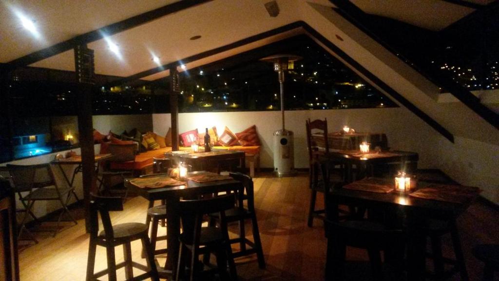 Restoran või mõni muu söögikoht majutusasutuses Hatun Quilla