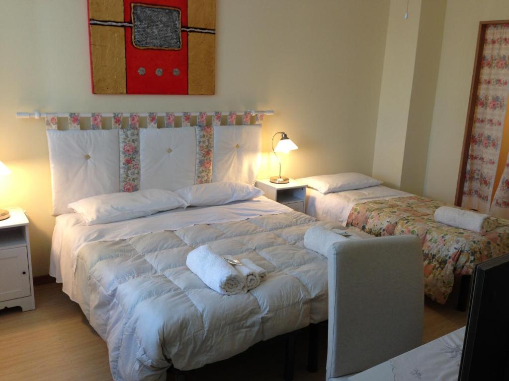 Postel nebo postele na pokoji v ubytování B&B Marzia