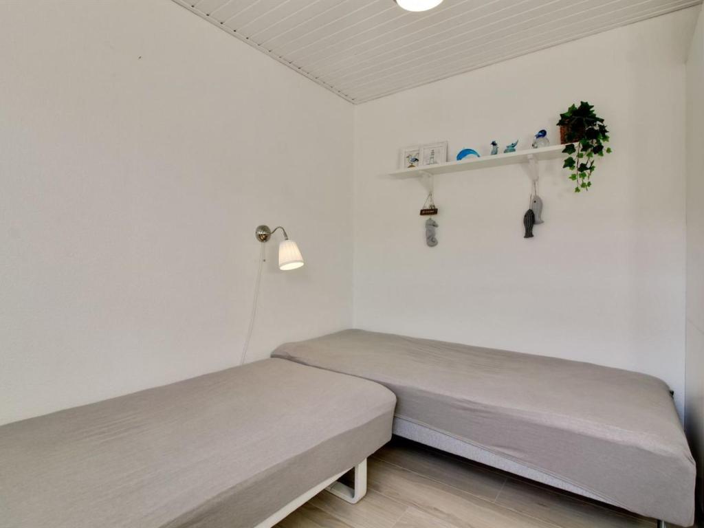 Postel nebo postele na pokoji v ubytování Apartment Oddi - 900m from the sea by Interhome