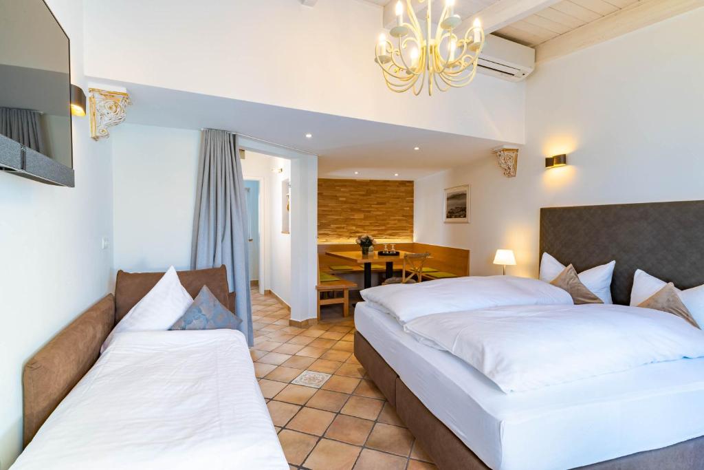 Postel nebo postele na pokoji v ubytování Apartment Hotel Schreier