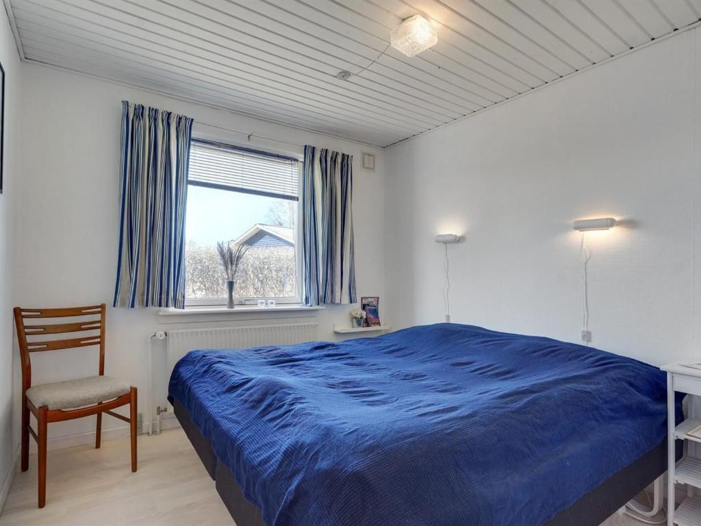 Postel nebo postele na pokoji v ubytování Holiday Home Fredrikke - 50m from the sea by Interhome