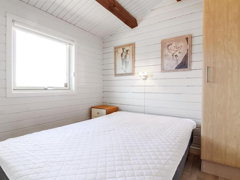 Postel nebo postele na pokoji v ubytování Holiday Home Sinnika - 75m from the sea by Interhome