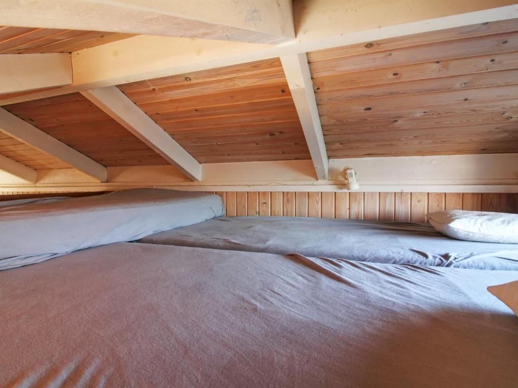 Postel nebo postele na pokoji v ubytování Holiday Home Sixten - 450m from the sea by Interhome