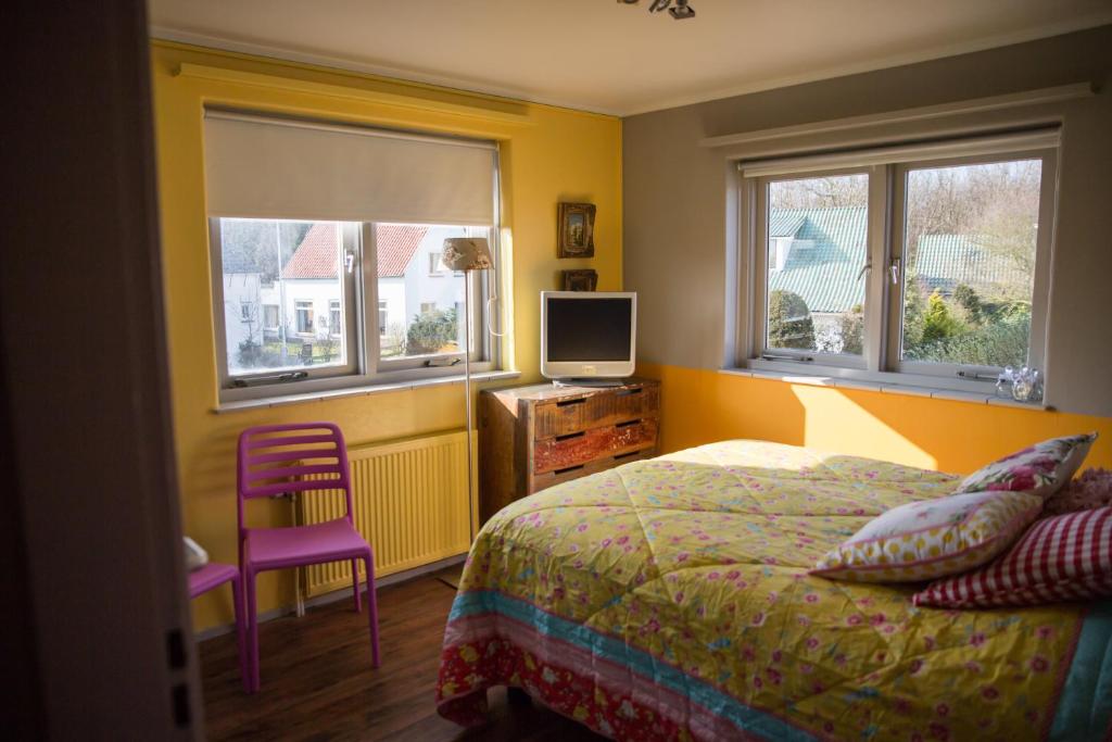 Postel nebo postele na pokoji v ubytování Hotel Domburg4you