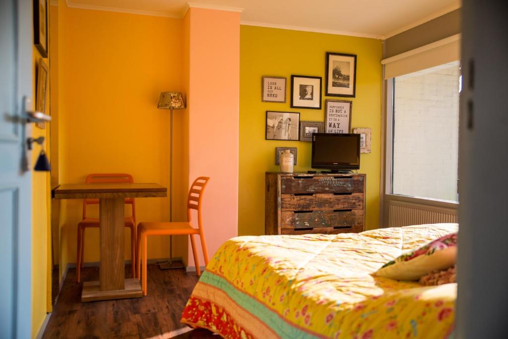 Postel nebo postele na pokoji v ubytování Hotel Domburg4you