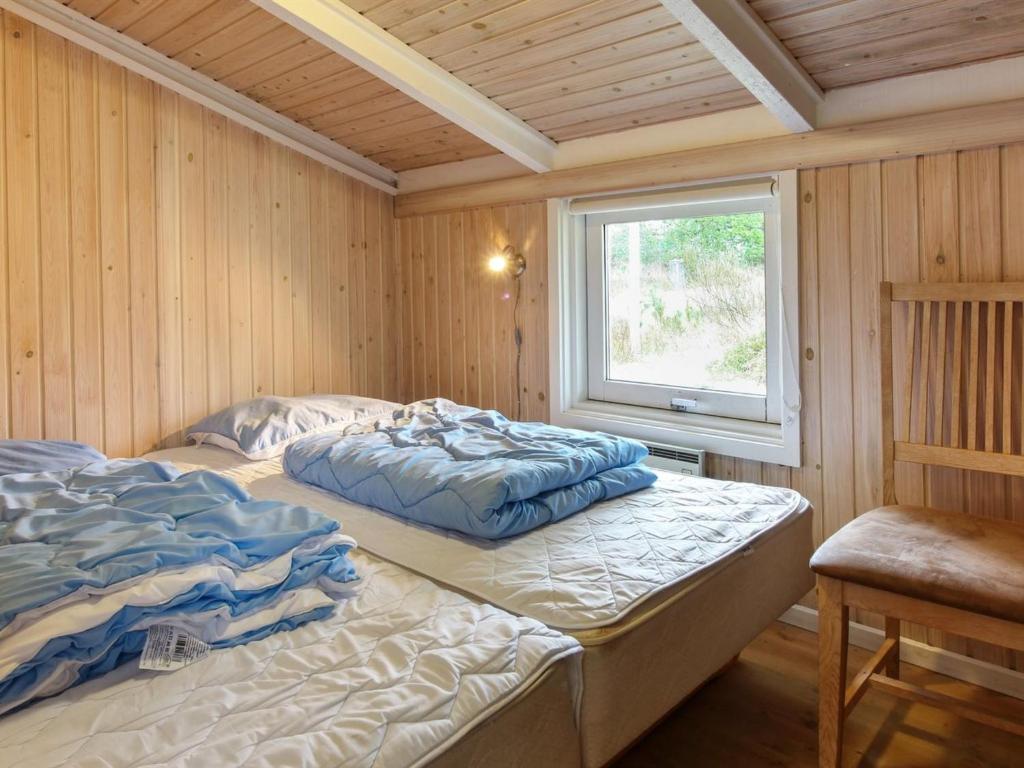 Postel nebo postele na pokoji v ubytování Holiday Home Eldmar - 500m from the sea by Interhome