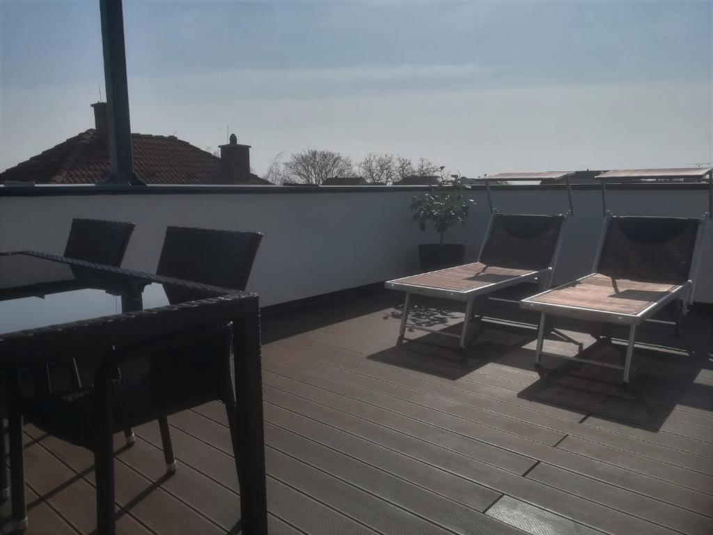 Balkón nebo terasa v ubytování PENTHOUSE Griemann 2 für max 4 Personen mit eigener großer Dachterrasse zum Relaxen!